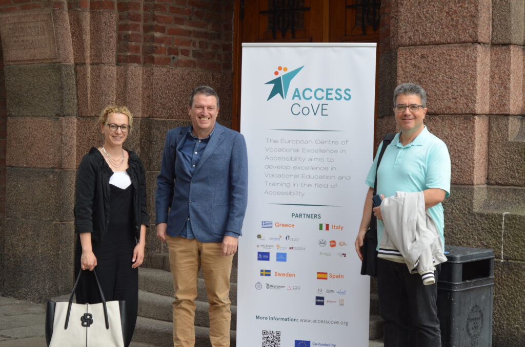 The team from University of Macedonia, the projects leading entity, gathered for a picture upon their arrival to KTH, standing by the roller with the AccessCoVE logo located outside the building for the meet. 